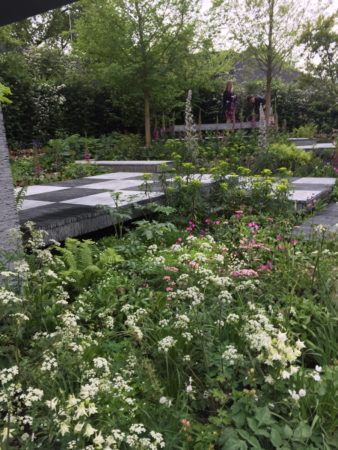 An estimated 40,000 squares of slate were used for this walkway. Lesson learned: Bold hardscaping looks best surrounded by subtle plantings.